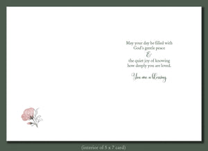 Greeting card interior with floral design and text on a white background